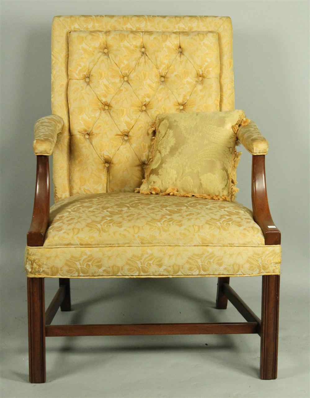 Appraisal: GEORGIAN STYLE OPEN ARM CHAIR WITH YELLOW TUFTED UPHOLSTERY having