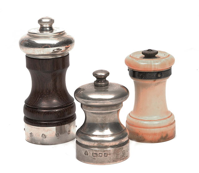 Appraisal: AN OLD TURNED IVORY AND SILVER MOUNTED PEPPER MILL cm