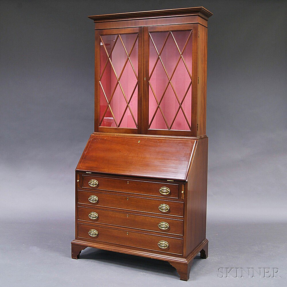 Appraisal: Kittinger Chippendale-style Mahogany Glazed Desk Bookcase the upper section with