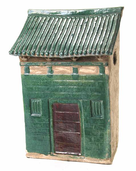 Appraisal: A Chinese Ming style glazed pottery model of a house