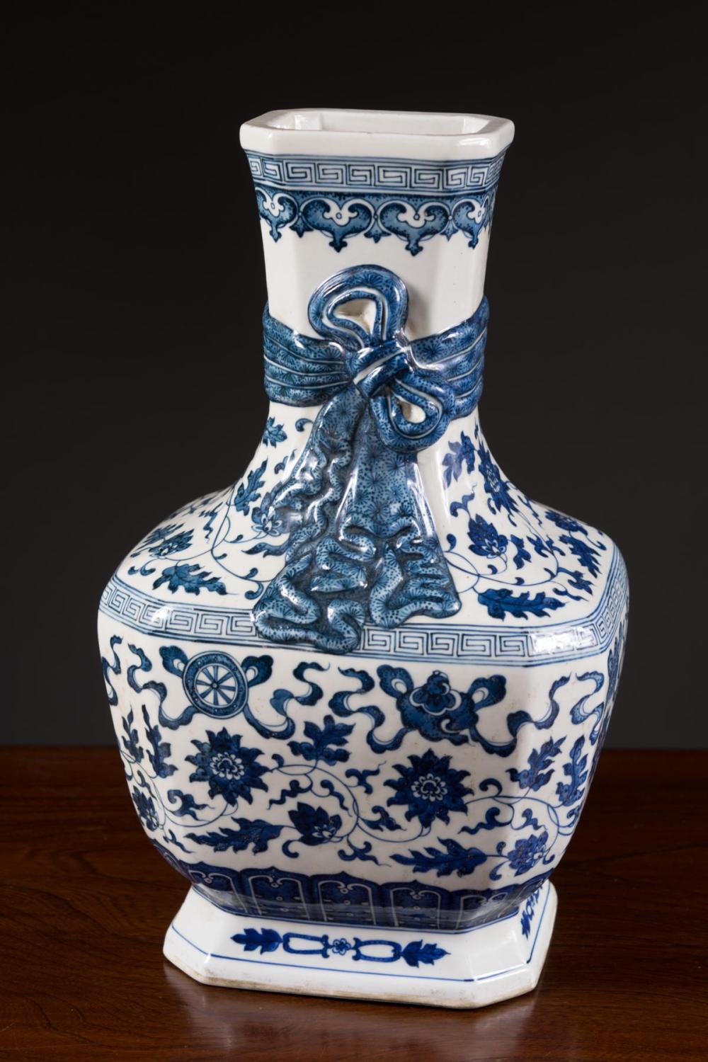 Appraisal: CHINESE BLUE AND WHITE PORCELAIN VASE octagonal with raised ribbon