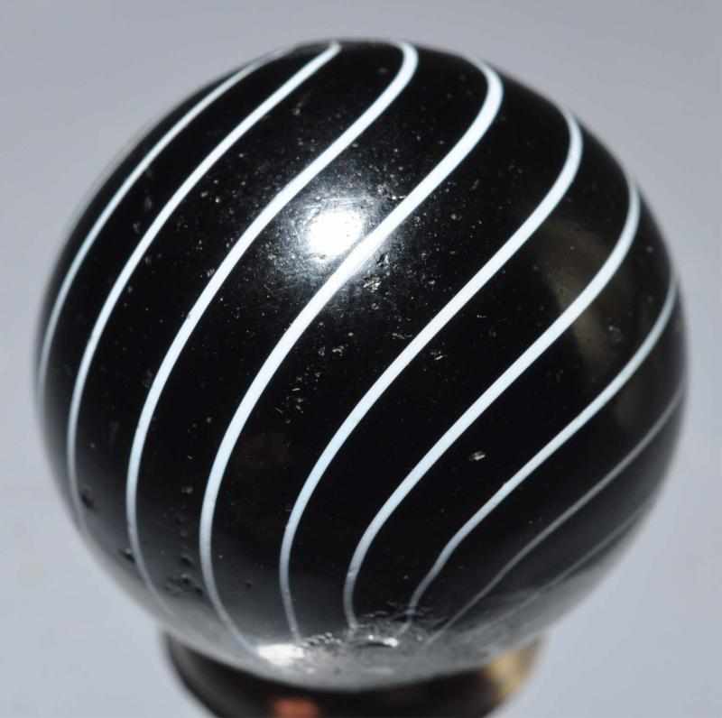 Appraisal: Black Clambroth Marble with White Lines Description Black base with