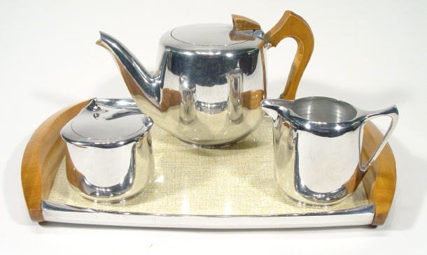 Appraisal: Picquet ware s three piece aluminium teaset on matching tray