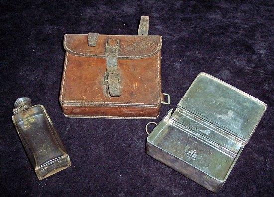 Appraisal: A sandwich tin and flask in a leather case and