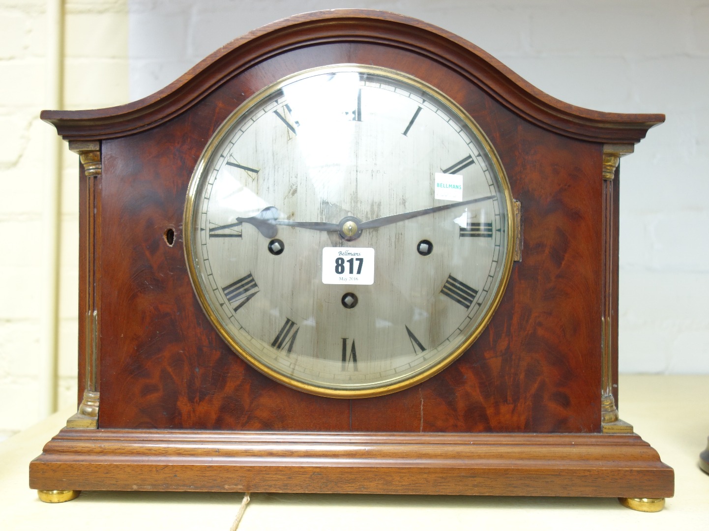 Appraisal: A mahogany cased mantel clock circa the domed top over