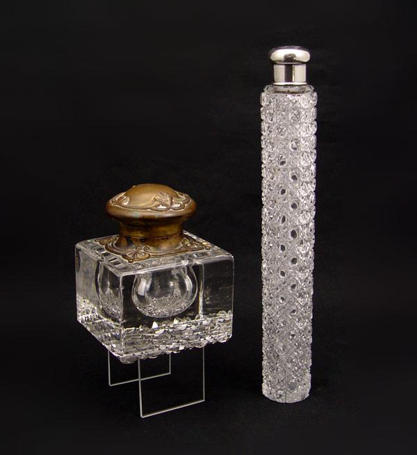 Appraisal: TIFFANY STERLING MOUNTED CUT GLASS BOTTLE To include Long cylindrical