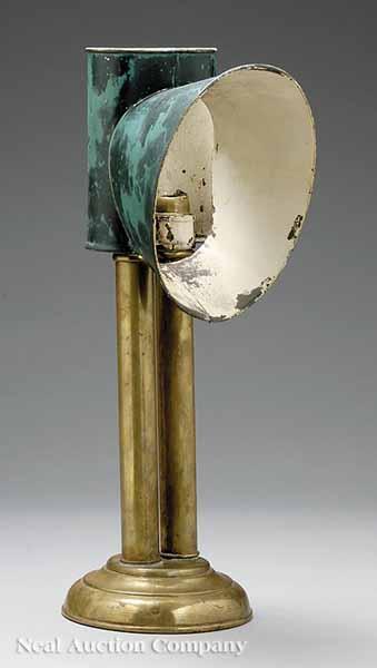 Appraisal: An Antique Brass and Painted Tin Reflector Lamp early th