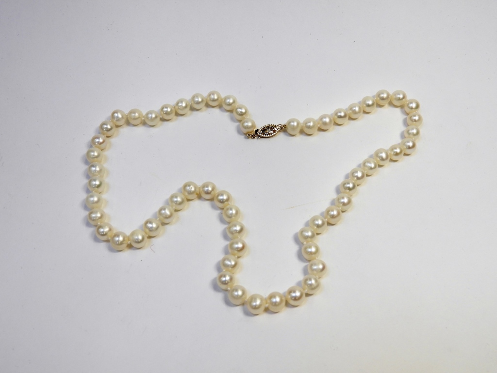 Appraisal: ESTATE IRIDESCENT PEARL NECKLACE MM Unknown th CenturyFifty seven mm