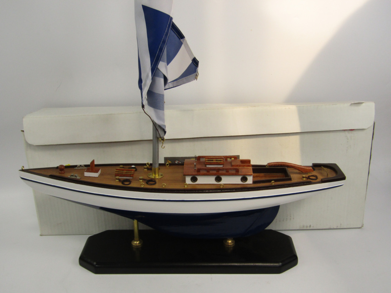 Appraisal: A Leonardo Collection ornamental scale model yacht with decorative materials