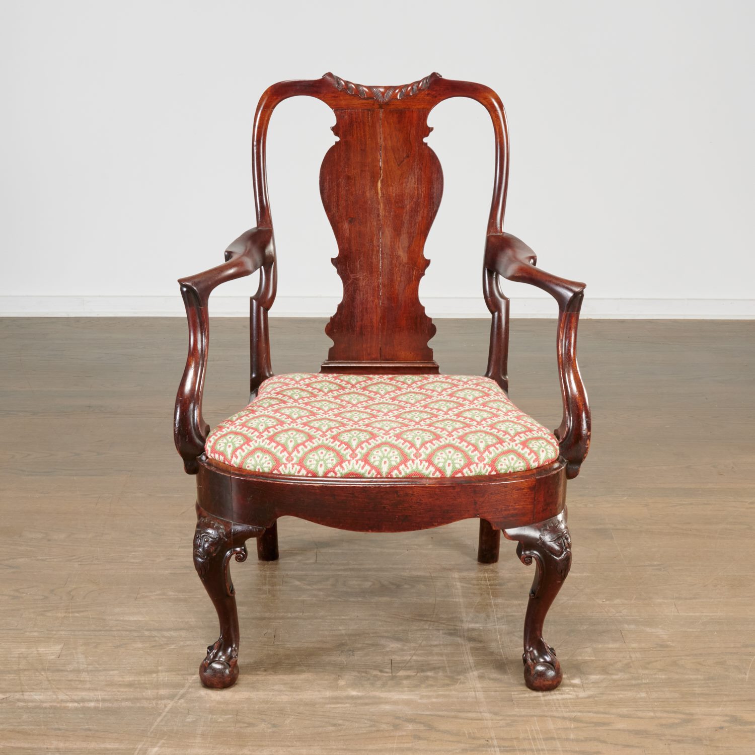 Appraisal: UNUSUAL GEORGE II CARVED MAHOGANY ARMCHAIR c likely Irish with