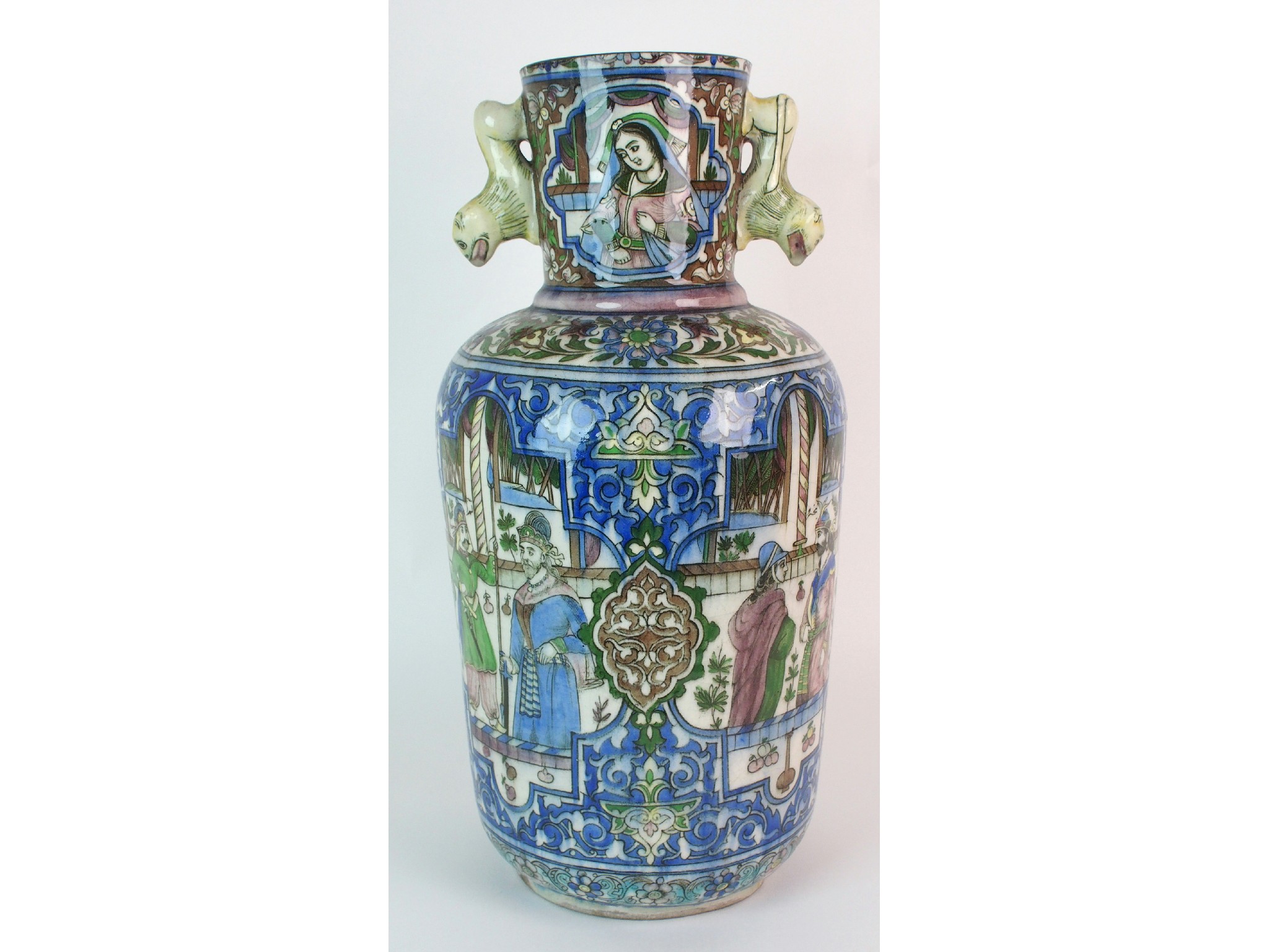 Appraisal: A large Persian two-handled baluster vasepainted with noblemen within geometric