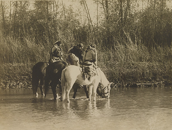 Appraisal: THROSSEL RICHARD - Crow Indians on horseback Silver print x