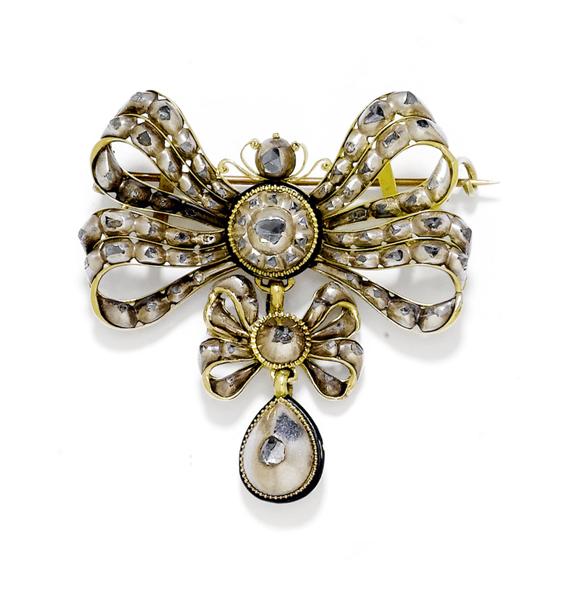 Appraisal: DIAMOND PENDANT BROOCH ca Silver and yellow gold Fancy three-part