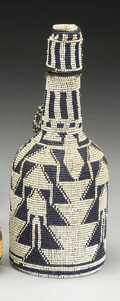 Appraisal: A Northeast California beaded bottle With an allover design of