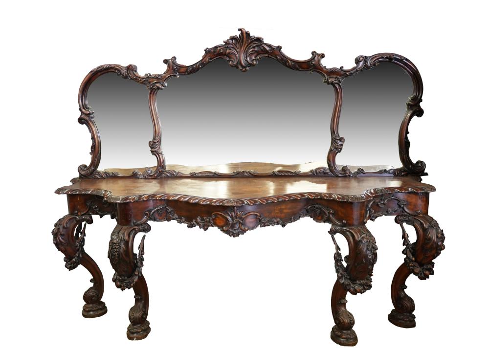 Appraisal: ROCOCO-STYLE CARVED WALNUT SIDEBOARDwith mirrored backboard Condition areas of discoloration