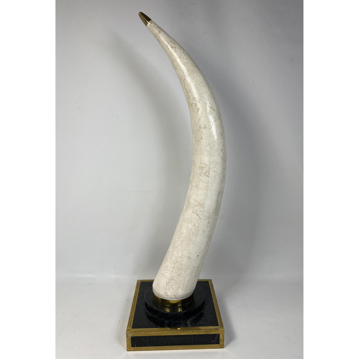 Appraisal: Tessellated stone tusk with brass accents by Marquis Collection Beverly