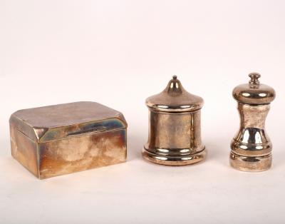 Appraisal: A silver cigarette box marks rubbed a silver pepper mill