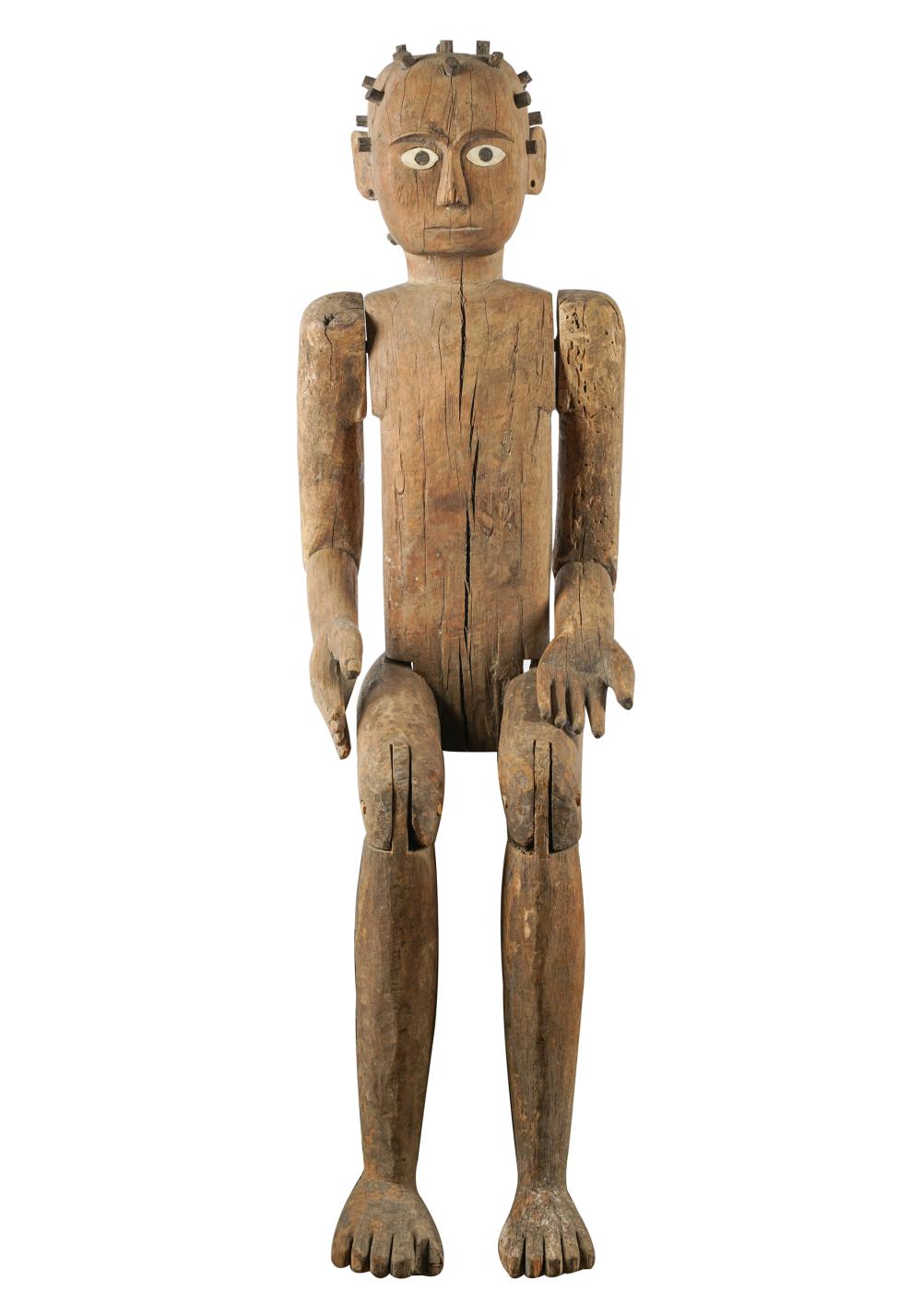 Appraisal: PRIMITIVE WOODEN FIGURE OF A SEATED CHILDlife-sized with removable arms