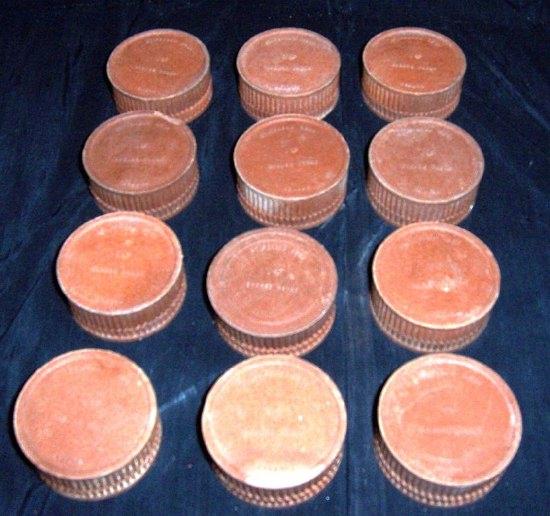 Appraisal: A quantity of Stipendum Ltd grease proof bakelite jars with