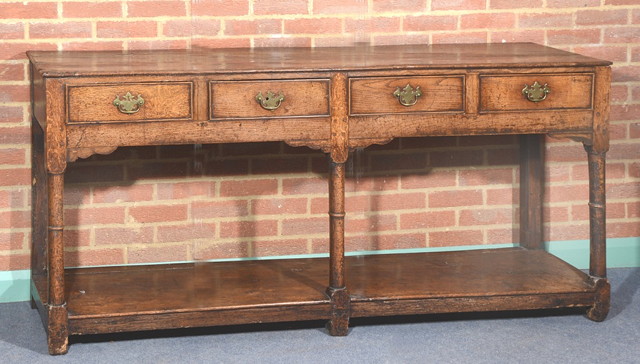 Appraisal: AN TH CENTURY OAK RECTANGULAR DRESSER fitted four long drawers