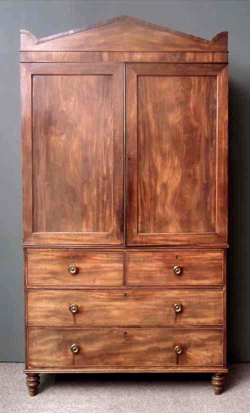 Appraisal: A George IV gentleman's mahogany wardrobe the upper part with