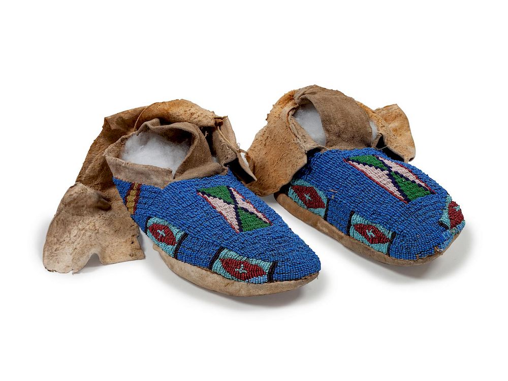 Appraisal: Northern Plains Beaded Hide Soft-Soled Moccasins length inches Northern Plains