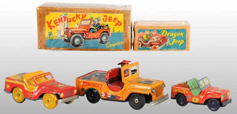 Appraisal: Lot of Tin Jeep Friction Toys Description Japanese Working Largest