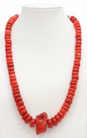 Appraisal: Native American red coral beaded necklace large naturalistic pendant bead