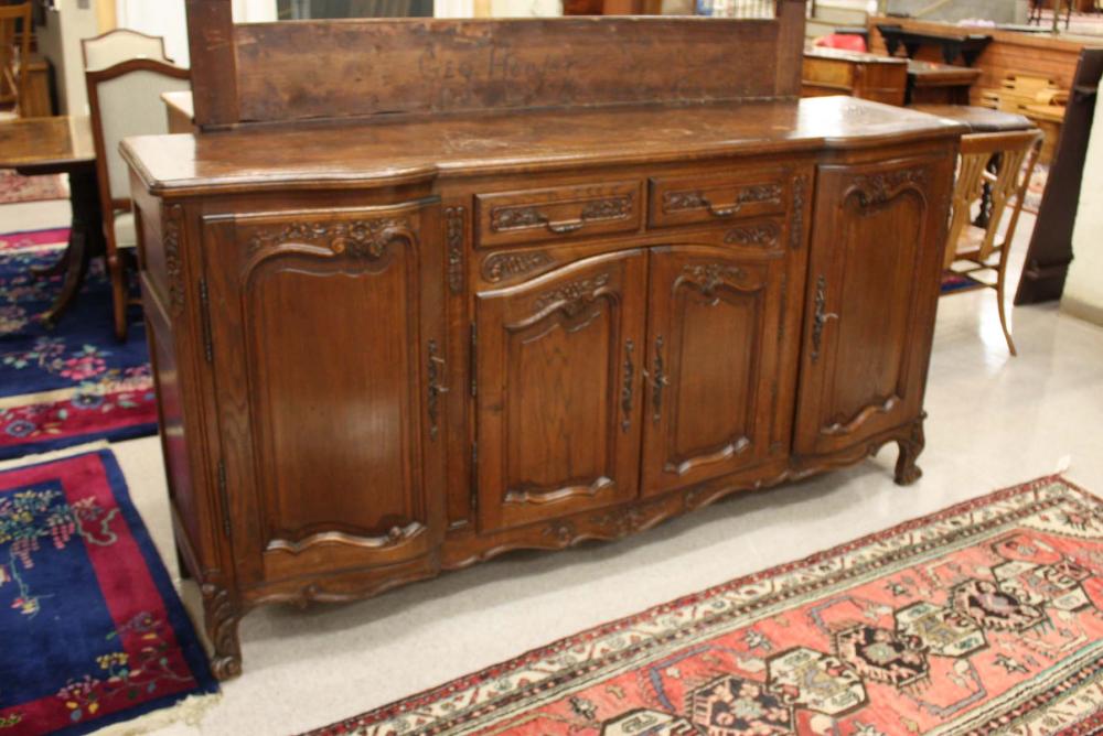 Appraisal: LOUIS XV STYLE CARVED OAK CREDENZA French th century having