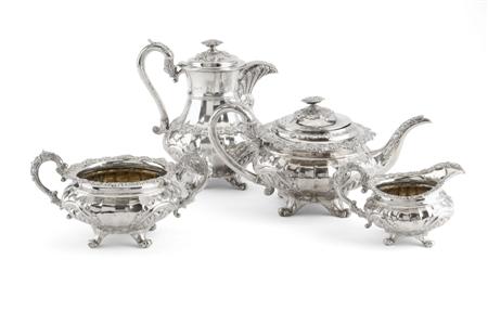 Appraisal: A George III four piece tea set comprising coffee pot