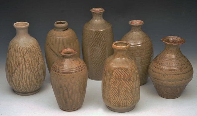 Appraisal: MIKE PALMER British A collection of seven Studio Pottery vases