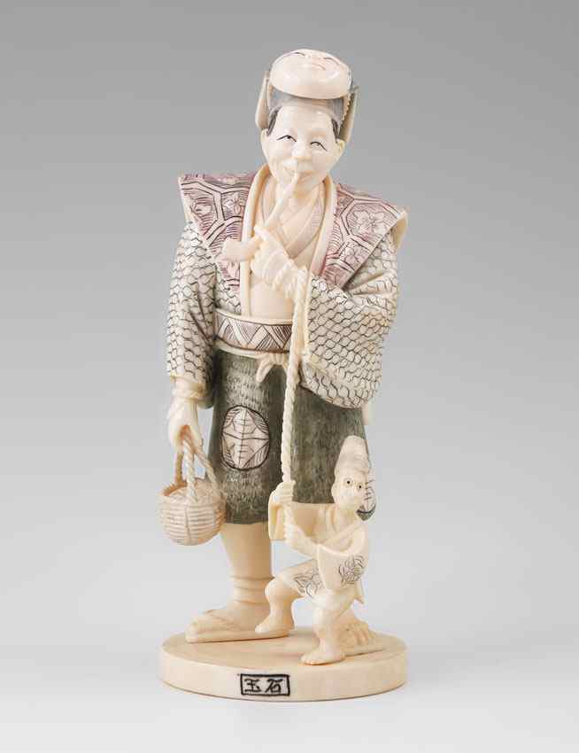 Appraisal: CARVED IVORY FIGURE OF AN ACTOR Carved figure of and