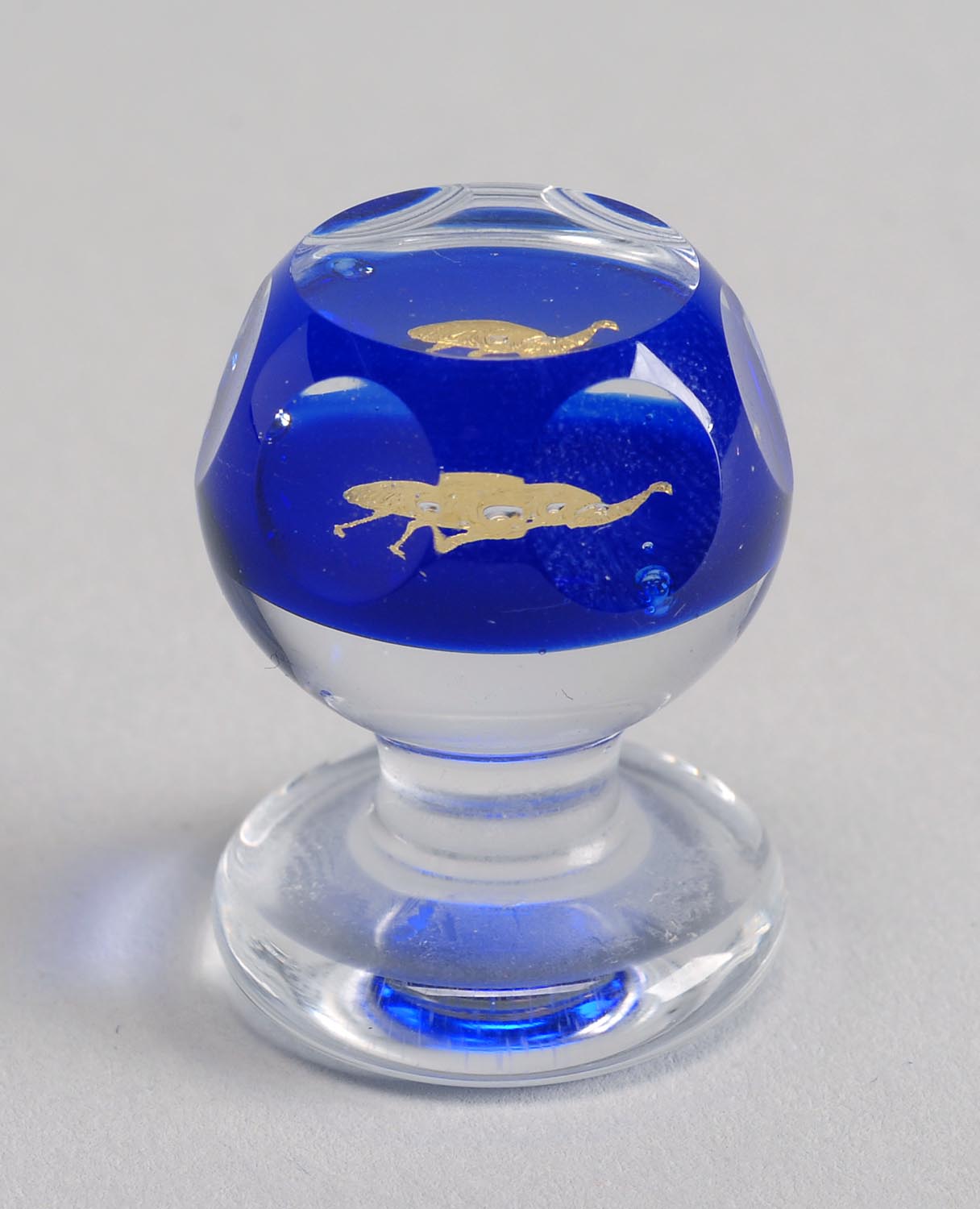 Appraisal: MINIATURE PEDESTAL PAPERWEIGHT BY CHARLES KAZIUN Depicting a gold peacock