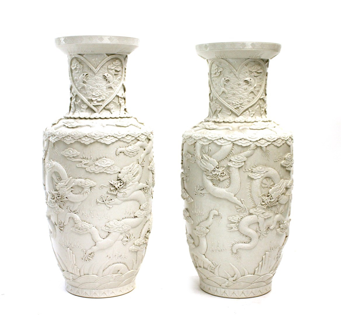 Appraisal: A pair of Chinese white porcelain rouleau vases late th