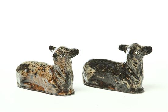 Appraisal: PAIR OF SEWERTILE SHEEP Probably Ohio th century Molded sheep