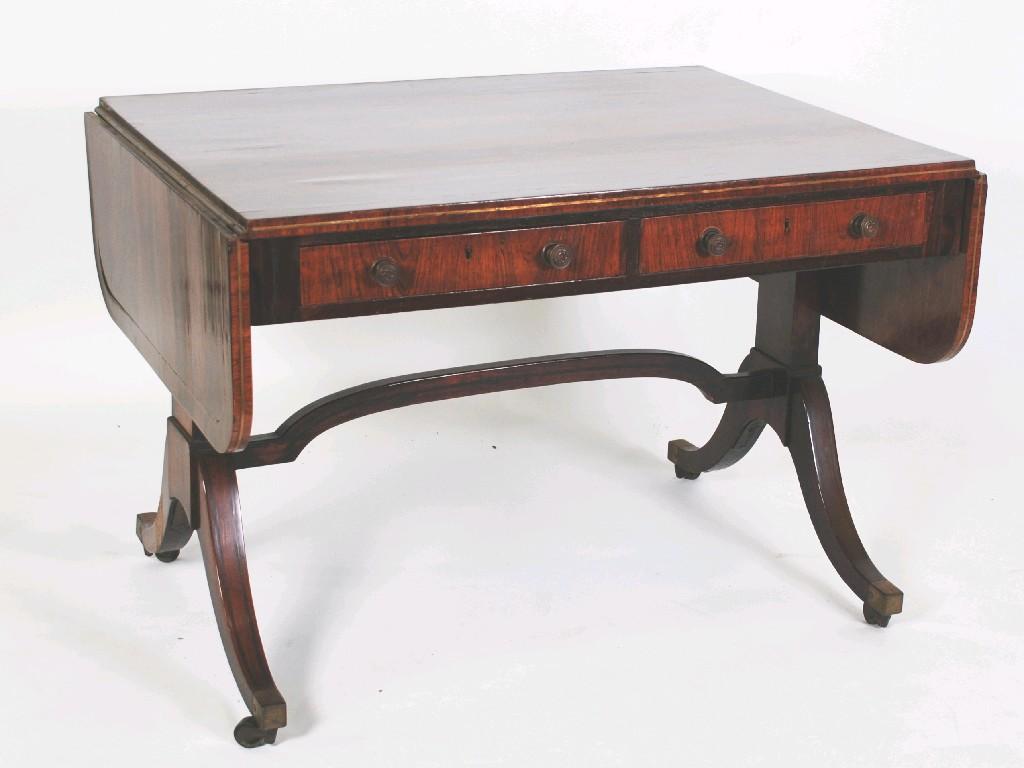 Appraisal: REGENCY PERIOD ROSEWOOD SOFA TABLE the well figured drop flap