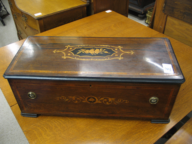 Appraisal: A MARQUETRY INLAID WALNUT AND ROSEWOOD MUSIC BOX CASE English