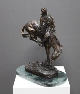 Appraisal: After Frederick Remington Bronze After Frederick Remington Bronze Depicting cowboy