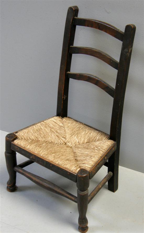 Appraisal: th Century childs ladderback chair with rush seat on turned