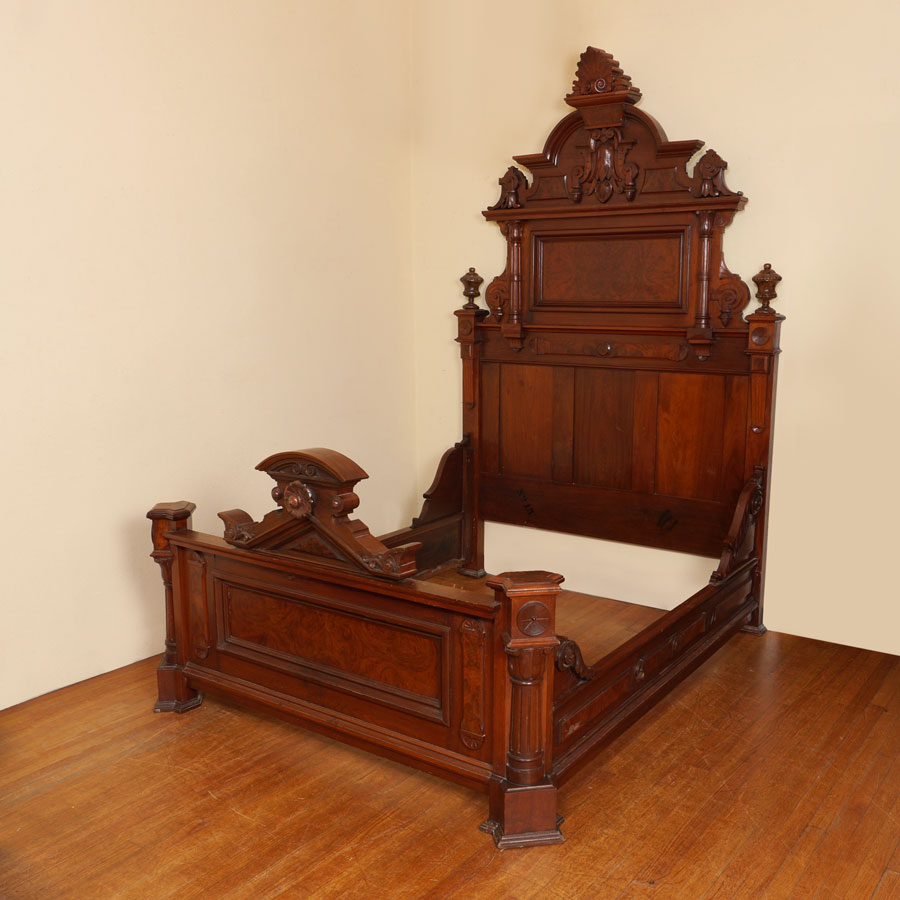 Appraisal: HIGH VICTORIAN MAHOGANY CARVED BED Headboard with arched pediment carved