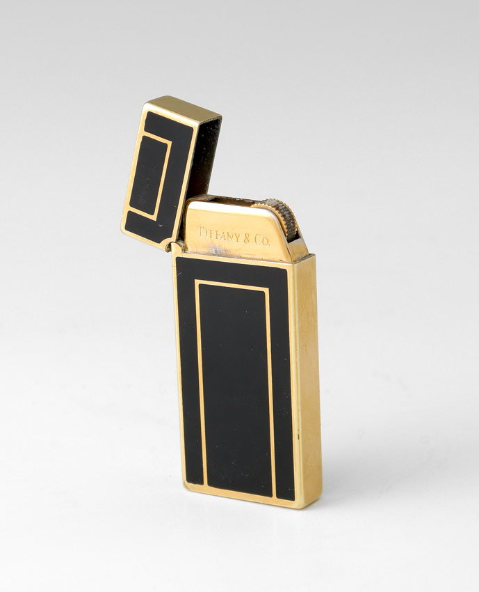 Appraisal: TIFFANY CO GOLD TONED LIGHTER Gold toned case with black