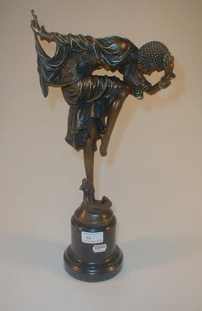 Appraisal: After Chiparus A Cast bronze figure of a dancer wearing