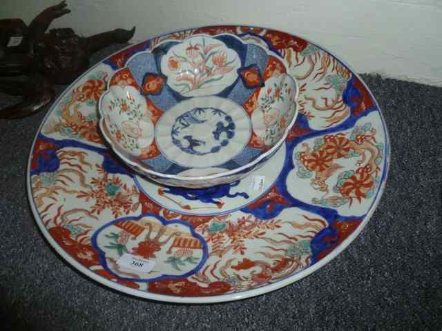 Appraisal: A JAPANESE IMARI CHARGER with blue and red stylised decoration