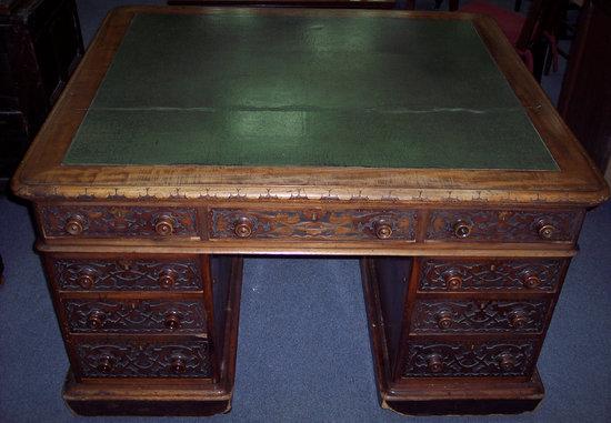 Appraisal: A Victorian partners' desk the top with inset leather surface