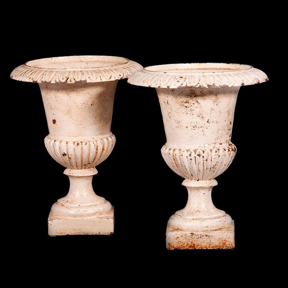 Appraisal: Pair of cast iron vase capitals A pair of late