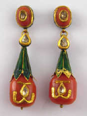 Appraisal: A pair of Indian enamel coral and diamond drop earrings