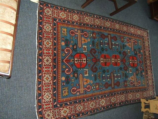 Appraisal: An Oriental blue ground rug x together with two further