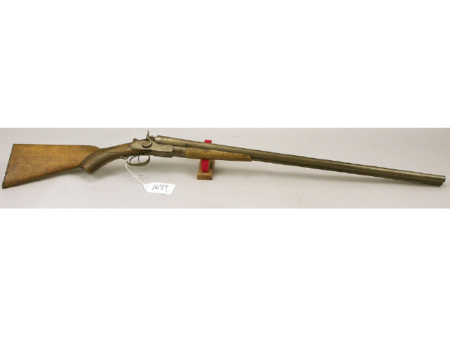 Appraisal: Occidental European gauge double barrel shotgun Great wall decorator Estimate