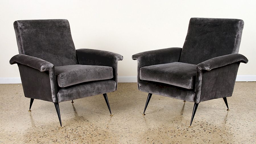 Appraisal: PAIR ITALIAN CLUB CHAIRS ON IRON LEGS C A pair