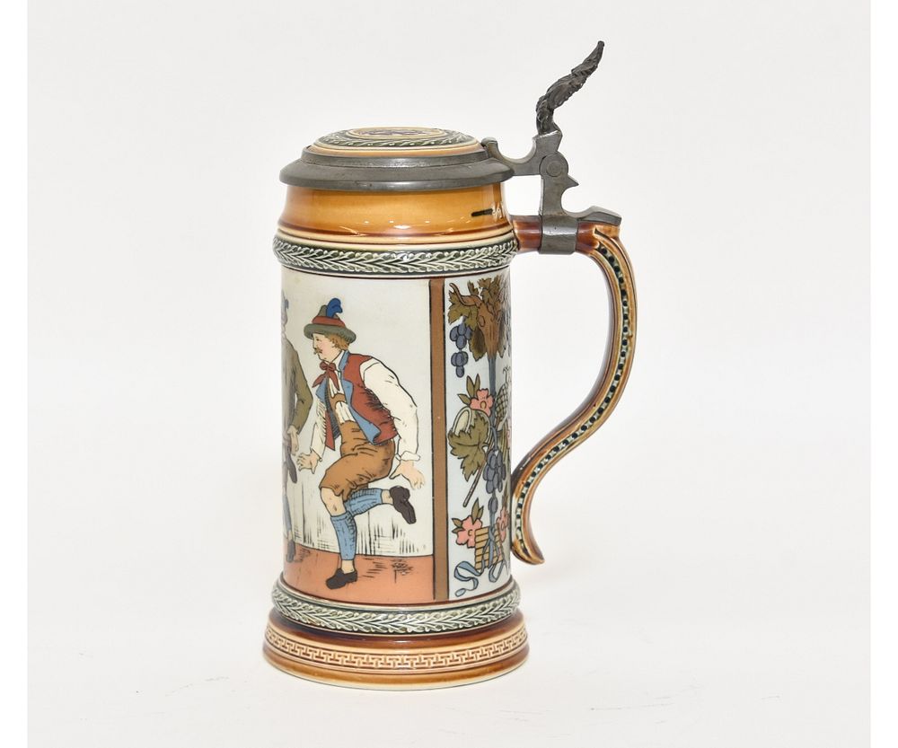 Appraisal: Mettlach Stein Mettlach stein with colorful dancers litre h x